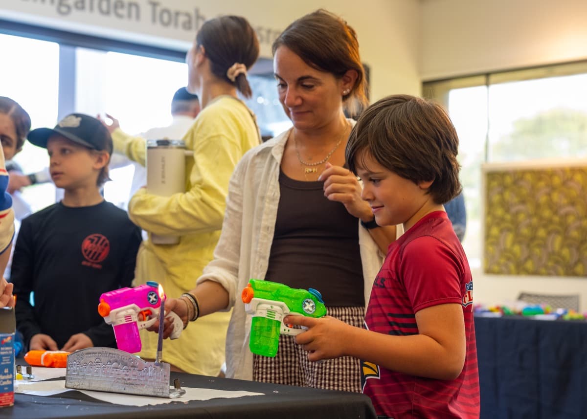 A parent and son at the Sunday School carnival